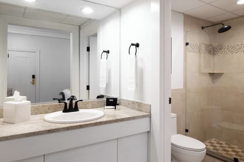 Enclave Interior Queen (No Windows) | Bathroom | Designer toiletries, hair dryer, bathrobes, towels
