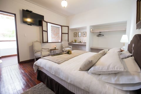 Executive Double Room, 1 Double Bed | Minibar, individually decorated, individually furnished, free WiFi