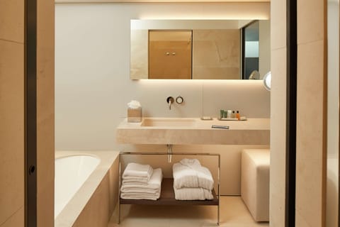 Loft Suite | Bathroom | Rainfall showerhead, free toiletries, hair dryer, bathrobes