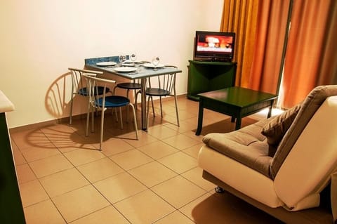 Apartment, 1 Bedroom | Living area | LCD TV