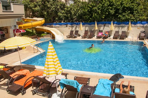 Outdoor pool, pool umbrellas, sun loungers