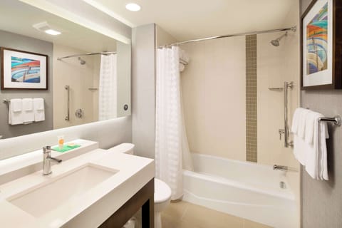 Shower, designer toiletries, towels