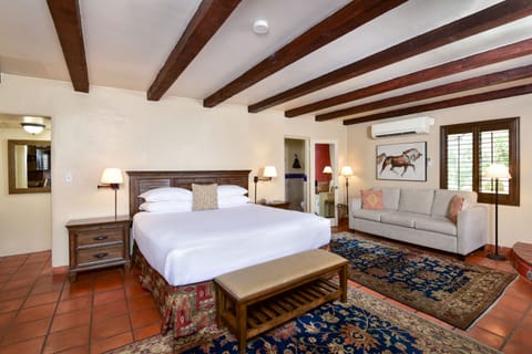 Standard Casita King | Premium bedding, memory foam beds, in-room safe, desk
