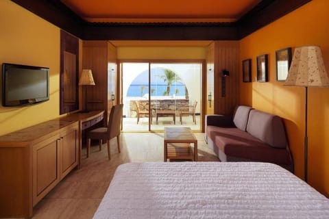 Standard Room, Balcony, Partial Sea View | Pillowtop beds, minibar, in-room safe, desk