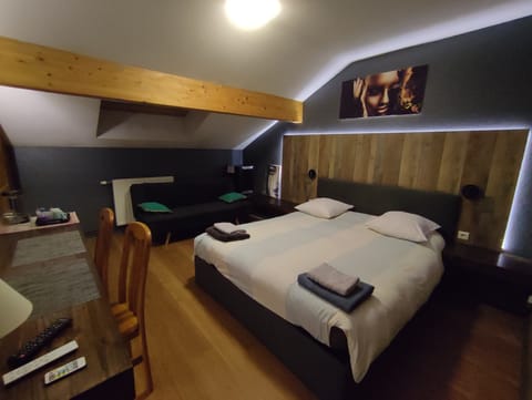 Triple Room | Down comforters, free minibar items, individually decorated, desk