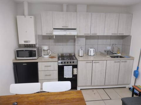 Classic Apartment, 1 Bedroom, Accessible, Ground Floor | Private kitchen | Full-size fridge, microwave, oven, stovetop