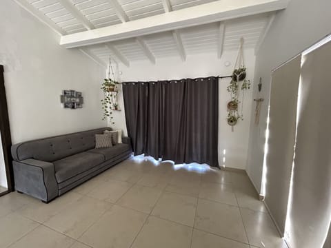 Family Apartment, 2 Bedrooms, Pool View | Living area | 43-inch flat-screen TV with cable channels, TV