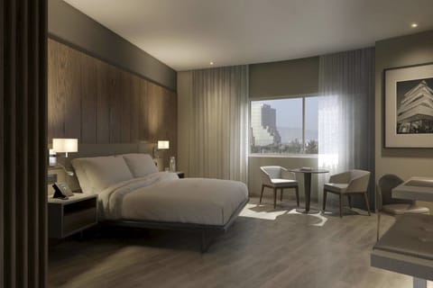 Room, 1 King Bed, City View | In-room safe, desk, laptop workspace, blackout drapes