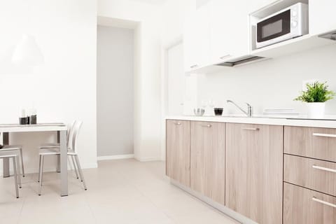 Comfort Apartment, 1 Bedroom | Private kitchen | Fridge, microwave, stovetop, espresso maker