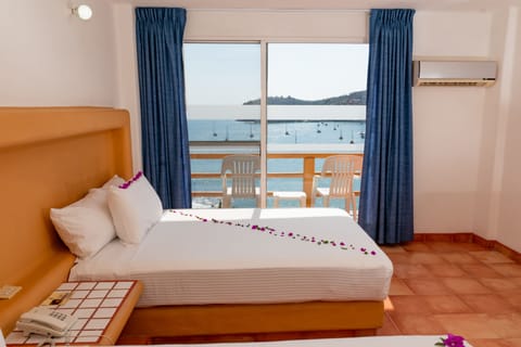 Standard Room, 2 Double Beds, Ocean View | Premium bedding, down comforters, in-room safe, blackout drapes