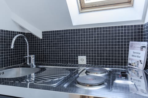 Deluxe Suite, 1 Bedroom, Sea View | Private kitchen | Espresso maker, coffee/tea maker, electric kettle