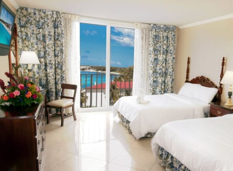 Room, Partial Ocean View | In-room safe, desk, blackout drapes, iron/ironing board
