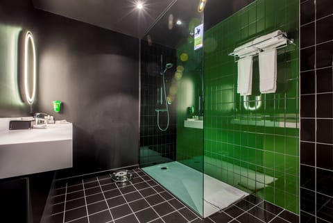 Shower, eco-friendly toiletries, hair dryer, towels