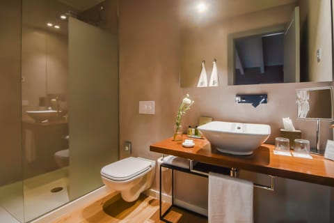 Superior Double Room | Bathroom | Rainfall showerhead, designer toiletries, hair dryer, bathrobes