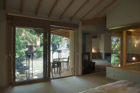 Private hot spring Suite room [Yuragi], Non Smoking | Living room | Fireplace