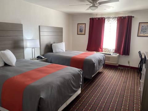 Deluxe Double Room | Desk, blackout drapes, iron/ironing board, free WiFi