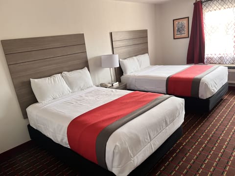 Deluxe Double Room | Desk, blackout drapes, iron/ironing board, free WiFi