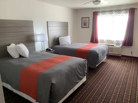 Deluxe Double Room | Desk, blackout drapes, iron/ironing board, free WiFi