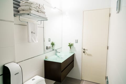 Junior Suite, 1 King Bed, Refrigerator & Microwave, Tower | Bathroom | Shower, free toiletries, hair dryer, bathrobes