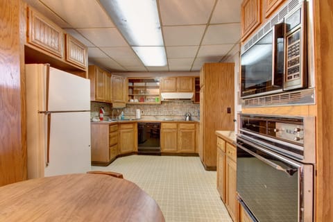 Suite, 2 Bedrooms | Private kitchen | Fridge, microwave, stovetop, coffee/tea maker