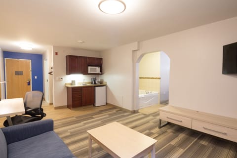 Suite, 1 King Bed, Jetted Tub | In-room safe, desk, laptop workspace, iron/ironing board