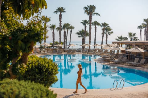 2 outdoor pools, open 8:30 AM to 6:30 PM, pool umbrellas, sun loungers
