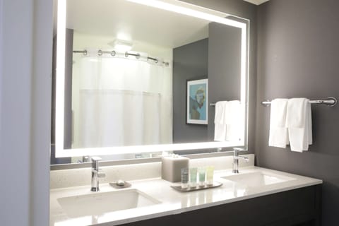 Suite, 1 Bedroom (2 Queen Beds) | Bathroom | Hydromassage showerhead, designer toiletries, hair dryer, bathrobes