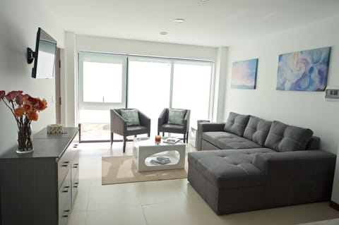 Premier Villa | Living room | 32-inch LED TV with satellite channels, TV, DVD player