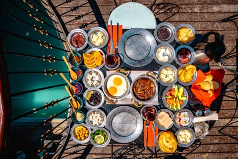 Breakfast, lunch, dinner served; Turkish cuisine, pool views 