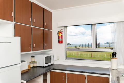 Family House, 4 Bedrooms, Partial Ocean View | Private kitchen | Full-size fridge, microwave, oven, stovetop