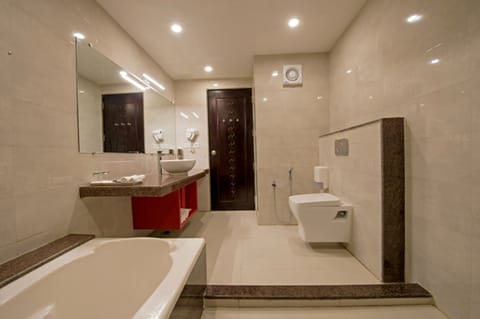 Suite | Bathroom | Shower, rainfall showerhead, hair dryer, slippers