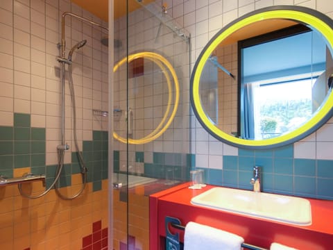 Suite, Multiple Beds, Balcony | Bathroom | Shower, eco-friendly toiletries, hair dryer, towels