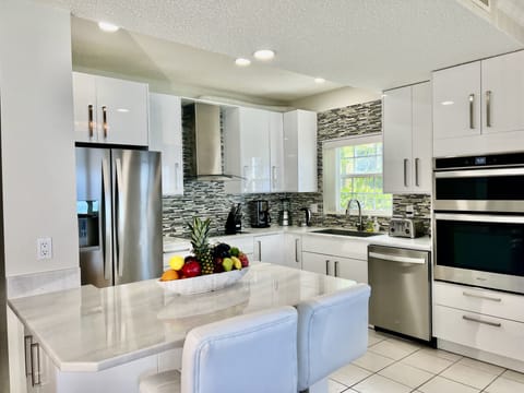 3 Bedroom Villa - Ocean Front #614 | Private kitchen | Full-size fridge, microwave, oven, stovetop