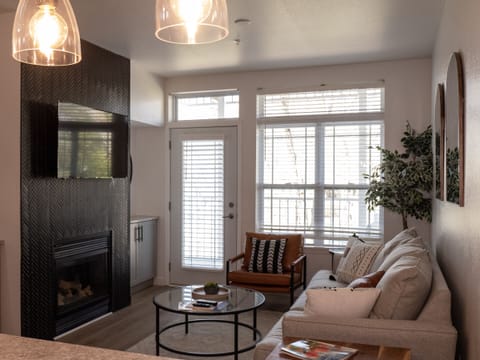 Standard Suite, 1 Bedroom | Living area | TV, fireplace