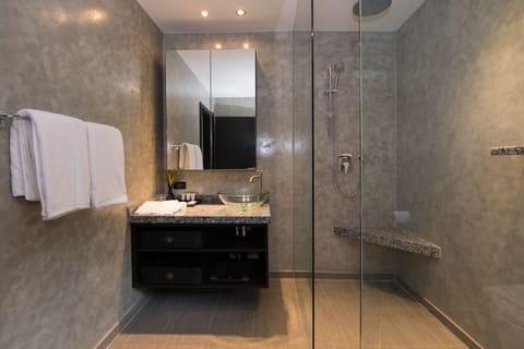 Junior Suite, 1 King Bed | Bathroom | Shower, rainfall showerhead, designer toiletries, hair dryer