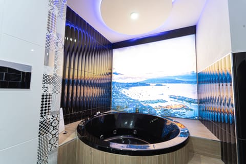 Suite, Bathtub | Private spa tub