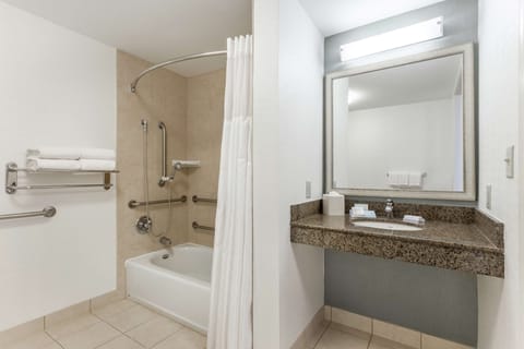 Two Queen Beds, Non-Smoking, Accessible | Bathroom | Hair dryer, towels, soap, shampoo