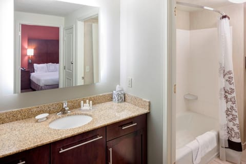 Suite, 1 Bedroom, Non Smoking, Fireplace | Bathroom | Separate tub and shower, designer toiletries, hair dryer, towels