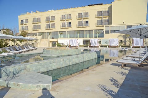 Indoor pool, seasonal outdoor pool, pool umbrellas, sun loungers