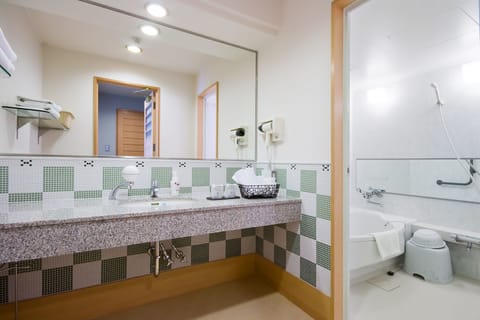 Japanese Style Room | Bathroom | Combined shower/tub, free toiletries, hair dryer, slippers