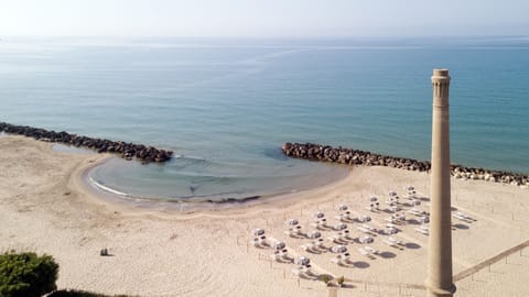 Private beach, white sand, sun loungers, beach umbrellas