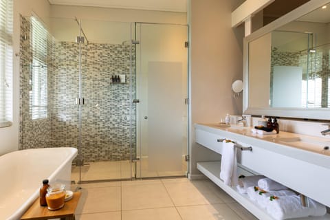 Separate tub and shower, deep soaking tub, eco-friendly toiletries