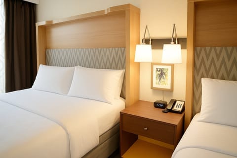 Hypo-allergenic bedding, desk, blackout drapes, iron/ironing board