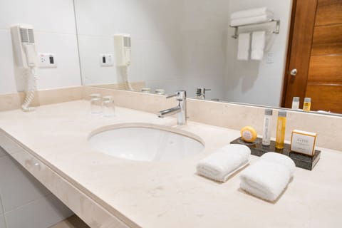 Junior Suite, 1 King Bed, Non Smoking | Bathroom | Combined shower/tub, deep soaking tub, rainfall showerhead