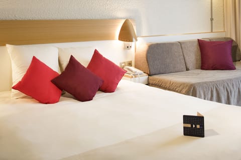 Premium bedding, free minibar, in-room safe, desk