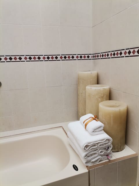 Suite, 1 King Bed (Master) | Bathroom | Shower, free toiletries, hair dryer, towels