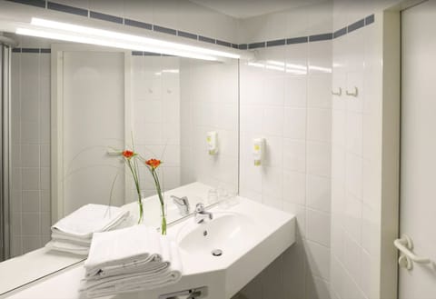 Shower, eco-friendly toiletries, hair dryer, towels