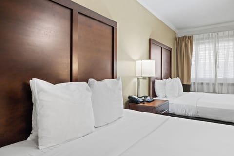 Desk, iron/ironing board, free cribs/infant beds, rollaway beds