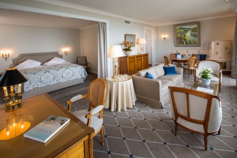 Executive Suite, Lake View | Minibar, in-room safe, soundproofing, iron/ironing board