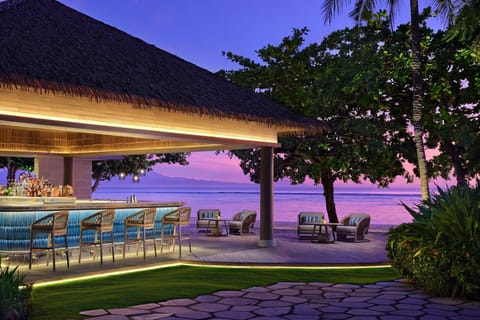 Beach nearby, white sand, beach umbrellas, beach towels